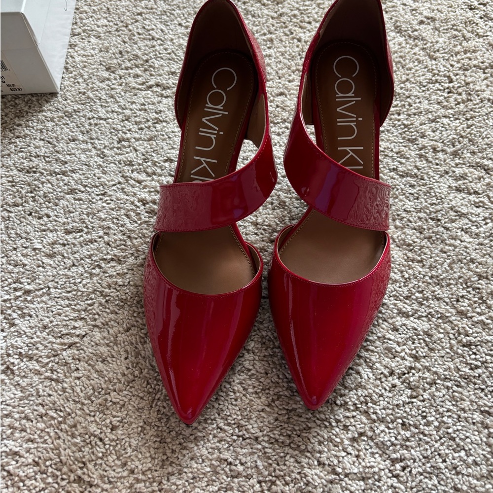 Calvin Klein pumps size 9.5, red patent